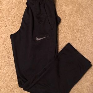 Black Nike athletic pants